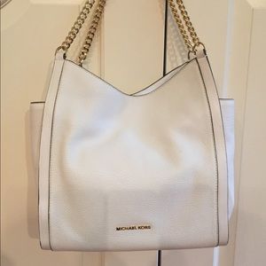 Michael Kors white bag w/gold chain/leather strap.